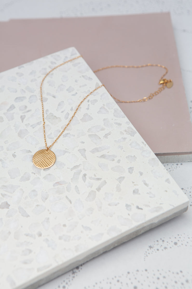Paradigm Shell Stamp Coin Necklace